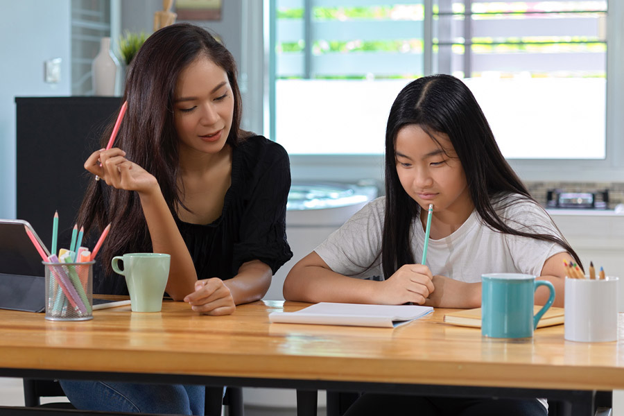 student and tutor together at a desk in Ventura